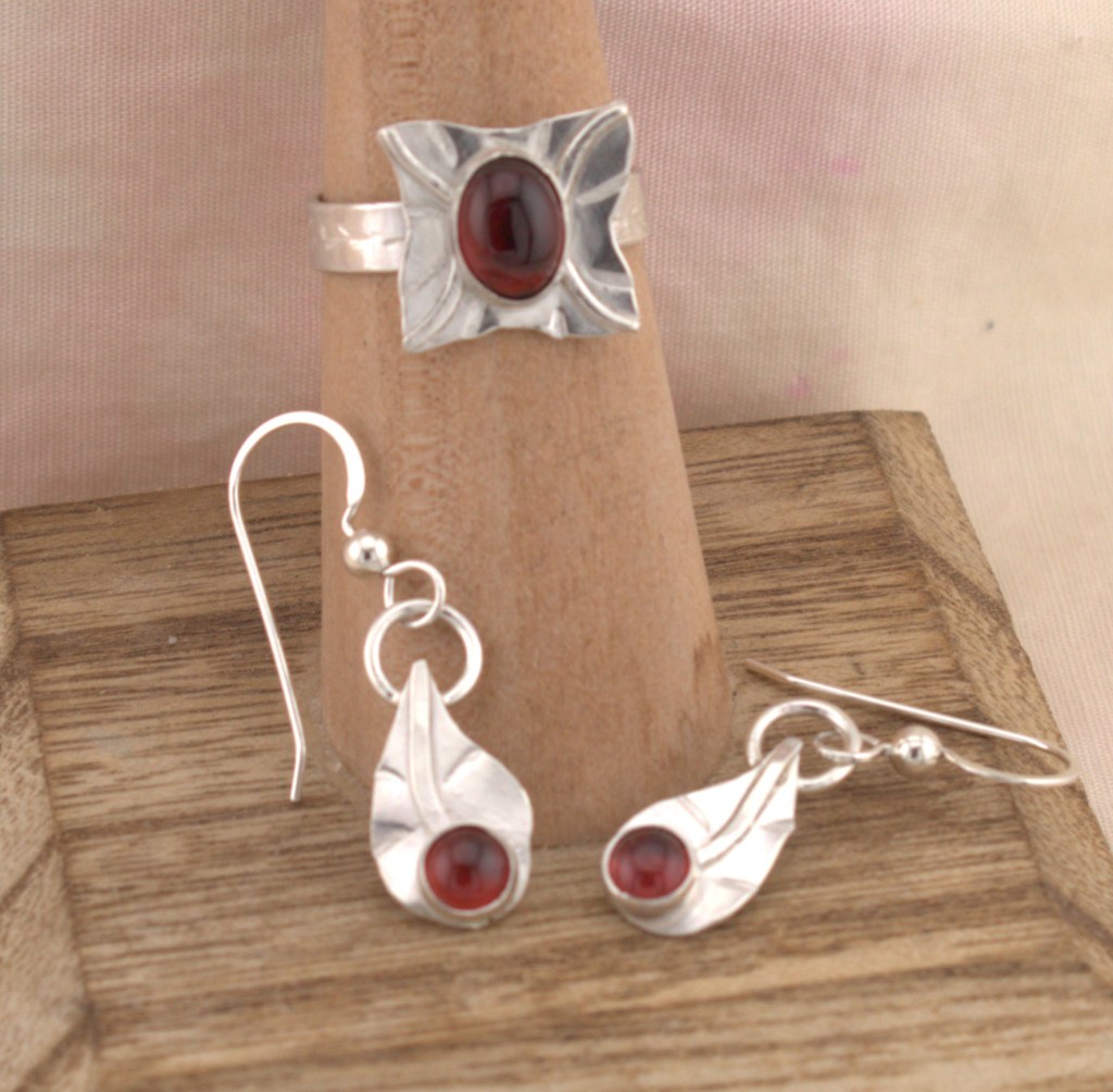 garnet ring and earrings in sterling silver