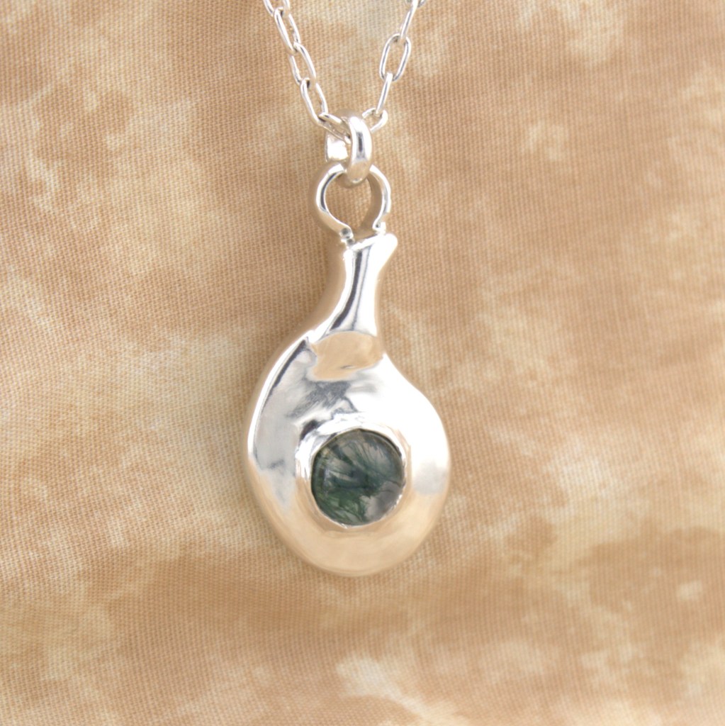 green moss agate pendant cast in sterling silver